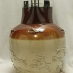 Sterling silver mounted stoneware hunting jug att. to Fulham