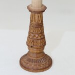 Carved wooden needle holder