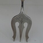 Silver plated bread fork with kangaroo finial