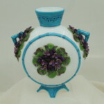 Porcelain flask vase with applied violets